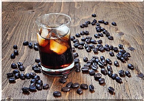 coffee beans and a glass of coke