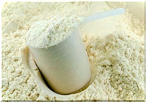 Milk powder and a plastic scoop