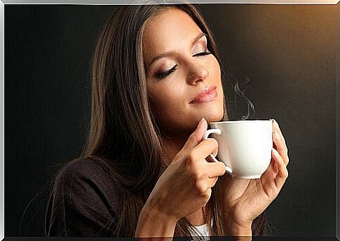 Woman with cup of coffee