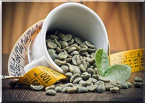 green coffee beans and a tape measure