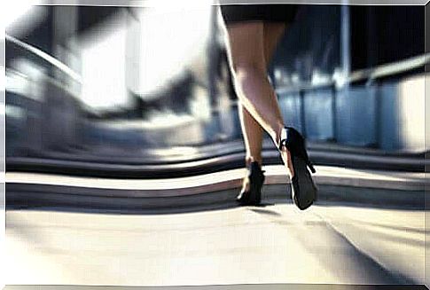 Woman running in high heels