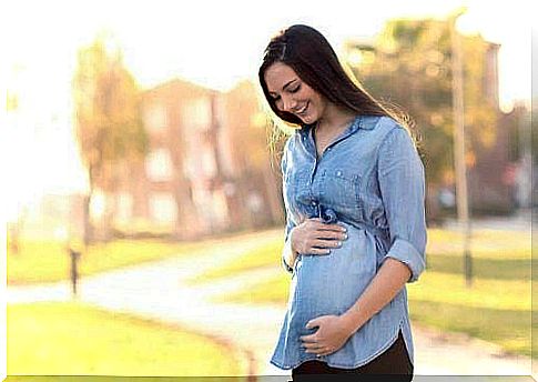 Pregnant woman in the park