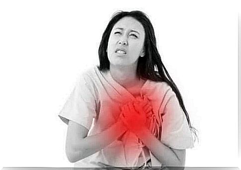 Woman having heart attack