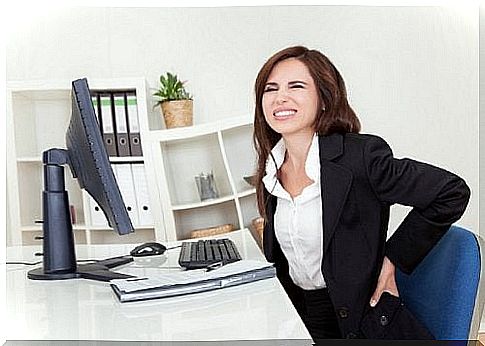 woman sitting in front of computer