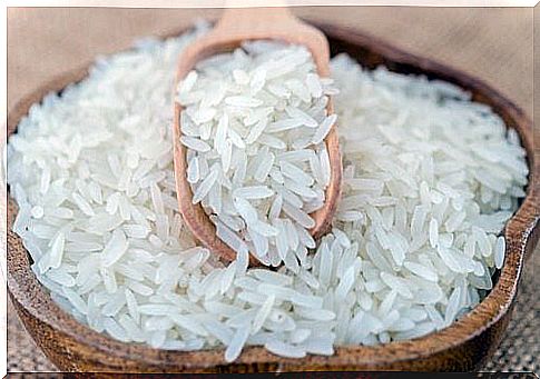 Wooden bowl with white rice