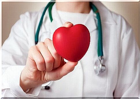 Doctor holding a heart shape