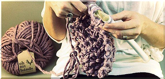 Knitting with Purple Wool